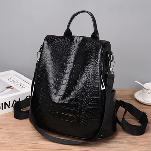 Black crocodile embossed anti-theft backpack with versatile three-way carry straps