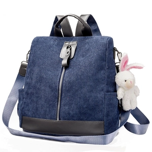 Navy corduroy multi-purpose backpack with leather base and cute rabbit pendant decoration