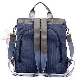 Blue corduroy backpack for women with gray leather trim and cute bunny charm