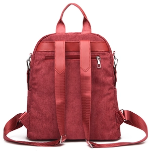 Burgundy corduroy backpack with anti-theft back pocket and multi-functional straps