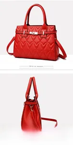 Detail view of red quilted PU leather tote bag with metallic clasp and adjustable strap