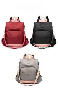 Présentation de sacs à dos en nylon rouge, noir et gris avec logo JINGPIN en trois couleurs