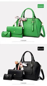 Detailed set of embossed leather handbags with green and black crocodile patterns