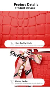 Macro view of red crocodile pattern handbag with elegant pink floral silk ribbon detail