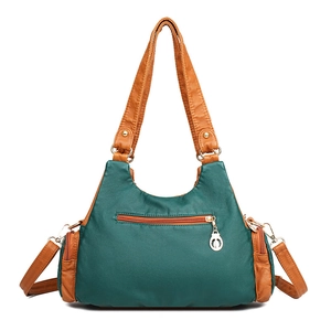 Retro washed leather tote bag in dark green with brown handles and large capacity