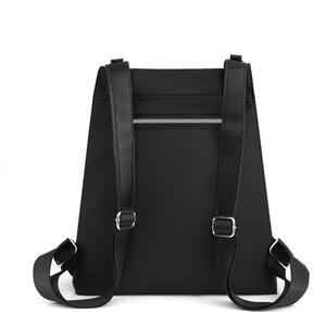 Minimalist black Oxford cloth backpack for women with anti-theft back pocket and adjustable straps