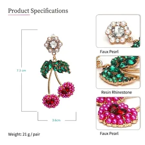 Dramatic cherry drop earrings with colorful faux pearls and rhinestones measuring 7.3cm