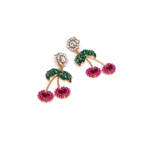 Exaggerated golden cherry earrings with pink pearls, red heart gems and green crystals
