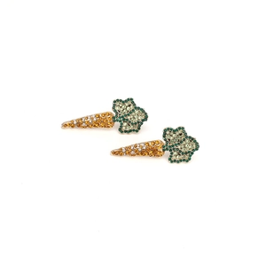 Detailed close-up of carrot-shaped earrings featuring vibrant orange and green rhinestones