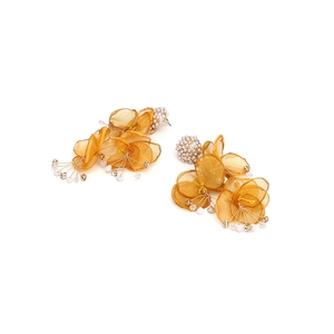 Detail of yellow tulle flower earrings with faux pearls and sparkling wire tassels