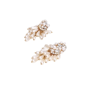 Exaggerated tassel earrings with white pearls and sparkling crystals in golden finish