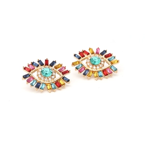 Detailed macro view of colorful rhinestone evil eye studs with vibrant crystal rays