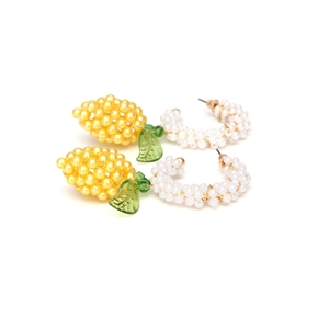 Handmade C-shaped beaded lemon earrings with yellow fruit beads and green leaves