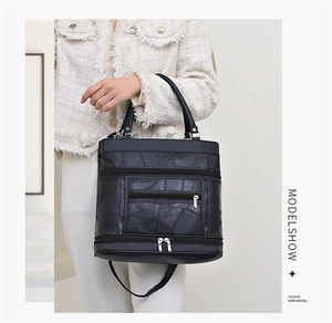 Detail view of the black retro soft leather handbag with multi-pocket patchwork design
