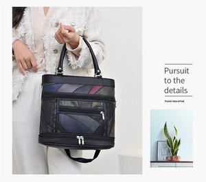 Close-up of multi-color patchwork leather handbag with premium silver metal zippers