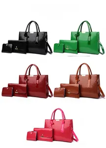 Detailed set of crocodile pattern tote bags with gold hardware in five vibrant colors
