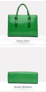 Detailed back and bottom view of green crocodile texture tote with metal protective feet