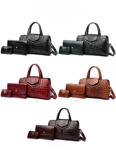 Three-piece handbag set featuring crocodile pattern embossing and Y-shaped stitching detail