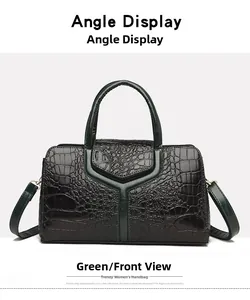 Front view of green tote bag featuring luxury crocodile pattern and magnetic V-shaped clasp