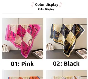 Detail view of equestrian chain print silk scarves in pink and black color options