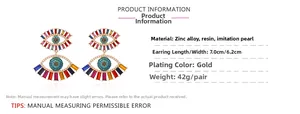 Detail view of large evil eye earrings with colorful resin diamonds and dimensions