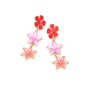 Detailed view of triple-tiered floral drop earrings with red and pink enamel petals