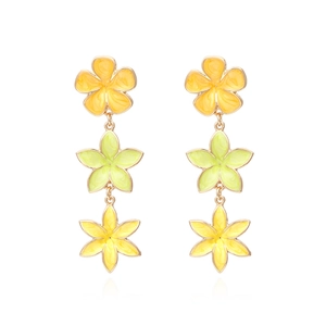 Three-tier colorful enamel flower drop earrings with golden metal base on white background