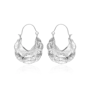 Modern hammered silver metal leaf earrings with textured finish and French hooks