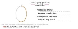 Detail view of dual-color chain necklace with silver rings and golden twisted metal rope