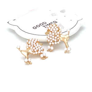 Chic golden alloy poodle stud earrings with white faux pearls on a minimalist background