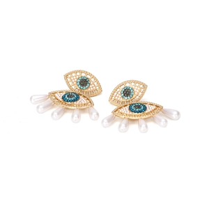 Evil eye earrings with blue rhinestones and dangling white pearls in gold finish