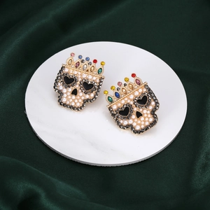 Gothic gold skull earrings with baroque pearls, heart eyes and colorful rhinestone crown
