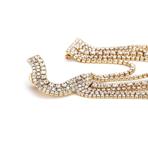 Broche à franges dorées exagérées avec strass multicouches et design géométrique