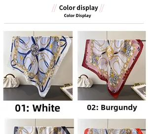 Detail of silk square scarves featuring classic chain and leopard print patterns