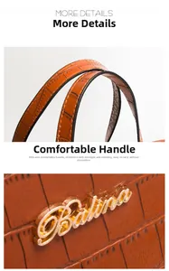 Detail der braunen Krokodilmuster-Handtasche mit Balina-Logo und verstärkten Handgriffen