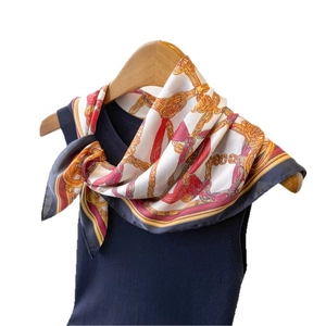 Vintage chain print silk square scarf featuring gold links and red tassel patterns