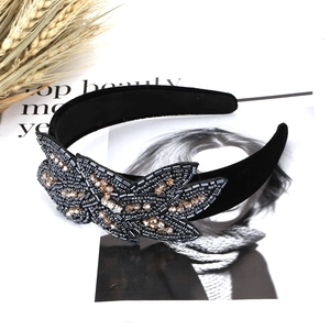 Handmade baroque velvet headband with intricate crystal beadwork and leaf patterns