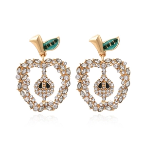 Sparkling crystal apple drop earrings with green enamel leaves on golden base