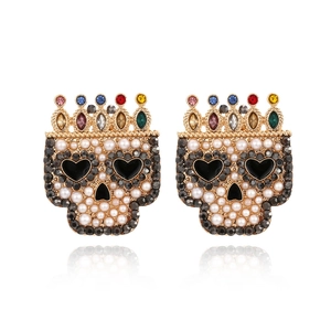 Baroque pearl skull earrings with colorful gemstone crown in vintage gothic style