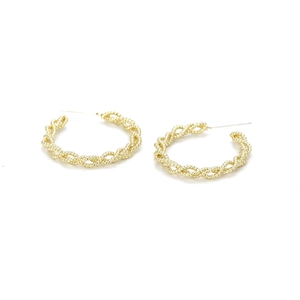 Minimalist twisted chain gold hoop earrings with intricate beaded texture on white background