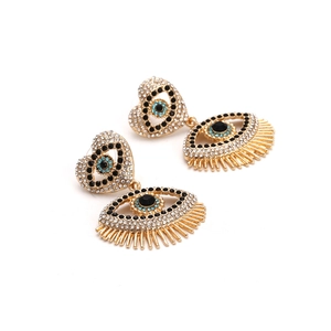 Golden heart and evil eye drop earrings with sparkling rhinestones and long lashes