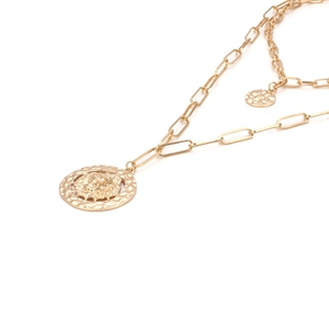 Retro gold layered paperclip chain necklace featuring a lion head and round hammered pendant