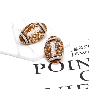 Boucles d'oreilles football américain avec cristaux marron et perles dorées brillantes
