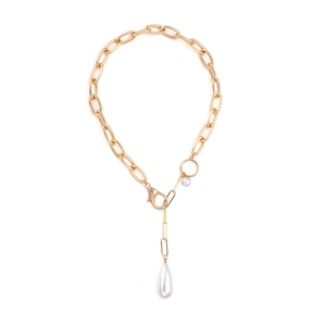 Baroque pearl pendant necklace with vintage gold chunky chain in an elegant flat lay view