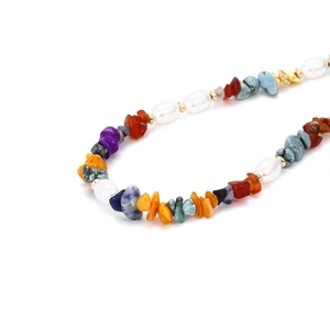 Handmade necklace with colorful natural stones and pearls in a bohemian choker style