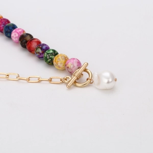 Colorful beaded necklace with gold OT buckle and baroque pearl pendant on white background
