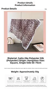 Detail view of leopard print silk-like square scarf with textile specs and care labels