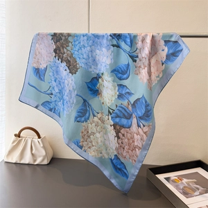 Elegant satin square silk scarf featuring a realistic blue and pink floral hydrangea print