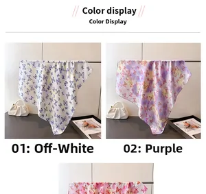 Detailed color display of cream and purple silk square scarves with butterfly prints