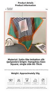 Detail view of a geometric silk-like satin square scarf with green and orange stripe pattern